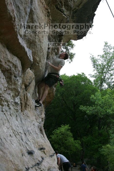 Adam Libson climbing Diving for Rocks (5.10d), shot by Andrew Dreher.  It was another long day of rock climbing at Seismic Wall on Austin's Barton Creek Greenbelt, Saturday, April 11, 2009.

Filename: SRM_20090411_15563629.JPG
Aperture: f/6.3
Shutter Speed: 1/200
Body: Canon EOS-1D Mark II
Lens: Canon EF 16-35mm f/2.8 L