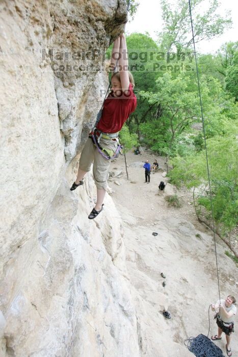 Kirsten Viering top rope climbing Diving for Rocks (5.10d), photographed from  the third bolt of Magster (5.10a).  It was another long day of rock climbing at Seismic Wall on Austin's Barton Creek Greenbelt, Saturday, April 11, 2009.

Filename: SRM_20090411_16191995.JPG
Aperture: f/4.0
Shutter Speed: 1/250
Body: Canon EOS-1D Mark II
Lens: Canon EF 16-35mm f/2.8 L