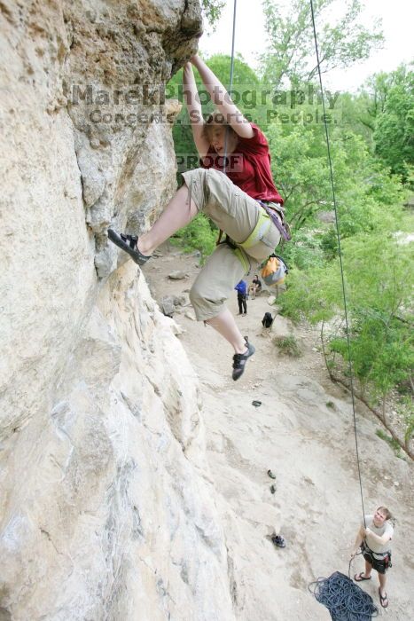 Kirsten Viering top rope climbing Diving for Rocks (5.10d), photographed from  the third bolt of Magster (5.10a).  It was another long day of rock climbing at Seismic Wall on Austin's Barton Creek Greenbelt, Saturday, April 11, 2009.

Filename: SRM_20090411_16192299.JPG
Aperture: f/4.0
Shutter Speed: 1/250
Body: Canon EOS-1D Mark II
Lens: Canon EF 16-35mm f/2.8 L