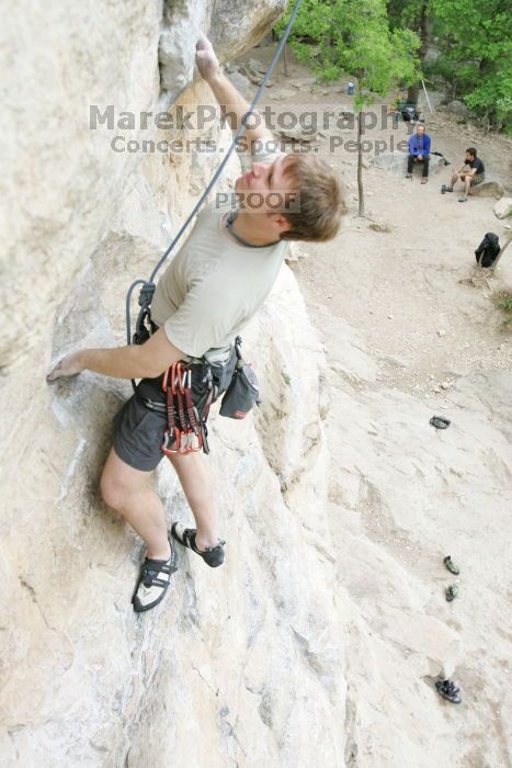 Adam Libson top rope climbing Diving for Rocks (5.10d), photographed from  the third bolt of Magster (5.10a).  It was another long day of rock climbing at Seismic Wall on Austin's Barton Creek Greenbelt, Saturday, April 11, 2009.

Filename: SRM_20090411_16241107.JPG
Aperture: f/4.0
Shutter Speed: 1/250
Body: Canon EOS-1D Mark II
Lens: Canon EF 16-35mm f/2.8 L