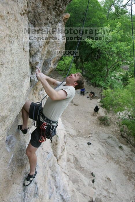 Adam Libson top rope climbing Diving for Rocks (5.10d), photographed from  the third bolt of Magster (5.10a).  It was another long day of rock climbing at Seismic Wall on Austin's Barton Creek Greenbelt, Saturday, April 11, 2009.

Filename: SRM_20090411_16251325.JPG
Aperture: f/5.0
Shutter Speed: 1/400
Body: Canon EOS-1D Mark II
Lens: Canon EF 16-35mm f/2.8 L