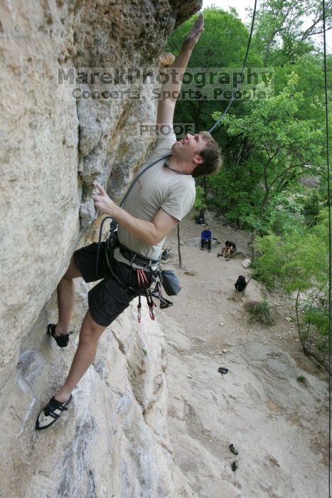 Adam Libson top rope climbing Diving for Rocks (5.10d), photographed from  the third bolt of Magster (5.10a).  It was another long day of rock climbing at Seismic Wall on Austin's Barton Creek Greenbelt, Saturday, April 11, 2009.

Filename: SRM_20090411_16251427.JPG
Aperture: f/5.0
Shutter Speed: 1/400
Body: Canon EOS-1D Mark II
Lens: Canon EF 16-35mm f/2.8 L