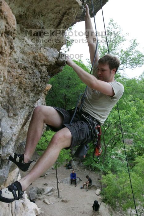 Adam Libson top rope climbing Diving for Rocks (5.10d), photographed from  the third bolt of Magster (5.10a).  It was another long day of rock climbing at Seismic Wall on Austin's Barton Creek Greenbelt, Saturday, April 11, 2009.

Filename: SRM_20090411_16252337.JPG
Aperture: f/5.0
Shutter Speed: 1/400
Body: Canon EOS-1D Mark II
Lens: Canon EF 16-35mm f/2.8 L