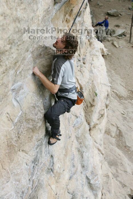 Andrew Dreher top rope climbing Diving for Rocks (5.10d), photographed from  the third bolt of Magster (5.10a).  It was another long day of rock climbing at Seismic Wall on Austin's Barton Creek Greenbelt, Saturday, April 11, 2009.

Filename: SRM_20090411_16414875.JPG
Aperture: f/5.6
Shutter Speed: 1/320
Body: Canon EOS-1D Mark II
Lens: Canon EF 16-35mm f/2.8 L