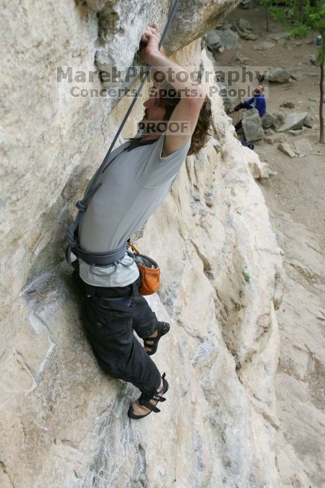 Andrew Dreher top rope climbing Diving for Rocks (5.10d), photographed from  the third bolt of Magster (5.10a).  It was another long day of rock climbing at Seismic Wall on Austin's Barton Creek Greenbelt, Saturday, April 11, 2009.

Filename: SRM_20090411_16415980.JPG
Aperture: f/5.6
Shutter Speed: 1/320
Body: Canon EOS-1D Mark II
Lens: Canon EF 16-35mm f/2.8 L