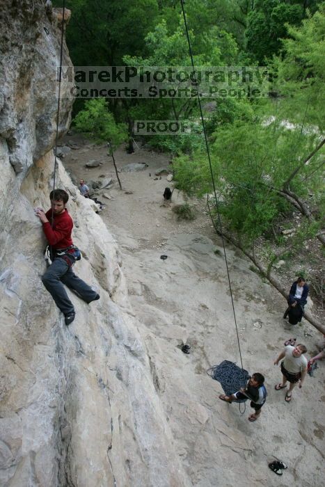 Me top rope climbing Diving for Rocks (5.10d) with Javier Morales belaying, photographed from  the third bolt of Magster (5.10a) by Andrew Dreher.  It was another long day of rock climbing at Seismic Wall on Austin's Barton Creek Greenbelt, Saturday, April 11, 2009.

Filename: SRM_20090411_17035776.JPG
Aperture: f/5.6
Shutter Speed: 1/320
Body: Canon EOS-1D Mark II
Lens: Canon EF 16-35mm f/2.8 L