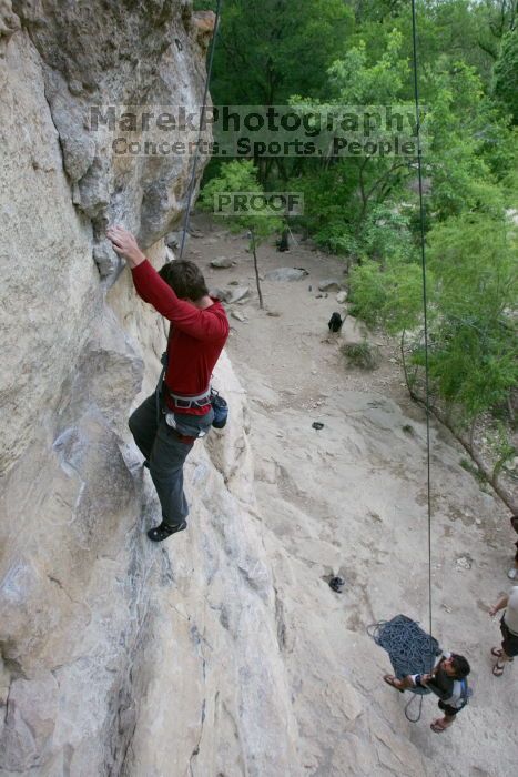 Me top rope climbing Diving for Rocks (5.10d) with Javier Morales belaying, photographed from  the third bolt of Magster (5.10a) by Andrew Dreher.  It was another long day of rock climbing at Seismic Wall on Austin's Barton Creek Greenbelt, Saturday, April 11, 2009.

Filename: SRM_20090411_17045890.JPG
Aperture: f/5.6
Shutter Speed: 1/320
Body: Canon EOS-1D Mark II
Lens: Canon EF 16-35mm f/2.8 L