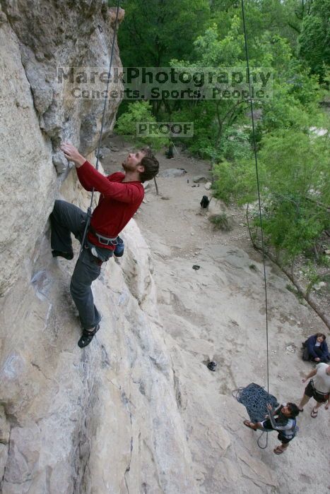 Me top rope climbing Diving for Rocks (5.10d) with Javier Morales belaying, photographed from  the third bolt of Magster (5.10a) by Andrew Dreher.  It was another long day of rock climbing at Seismic Wall on Austin's Barton Creek Greenbelt, Saturday, April 11, 2009.

Filename: SRM_20090411_17050191.JPG
Aperture: f/5.6
Shutter Speed: 1/320
Body: Canon EOS-1D Mark II
Lens: Canon EF 16-35mm f/2.8 L