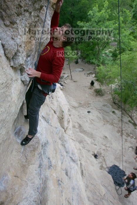 Me top rope climbing Diving for Rocks (5.10d) with Javier Morales belaying, photographed from  the third bolt of Magster (5.10a) by Andrew Dreher.  It was another long day of rock climbing at Seismic Wall on Austin's Barton Creek Greenbelt, Saturday, April 11, 2009.

Filename: SRM_20090411_17051093.JPG
Aperture: f/5.6
Shutter Speed: 1/320
Body: Canon EOS-1D Mark II
Lens: Canon EF 16-35mm f/2.8 L