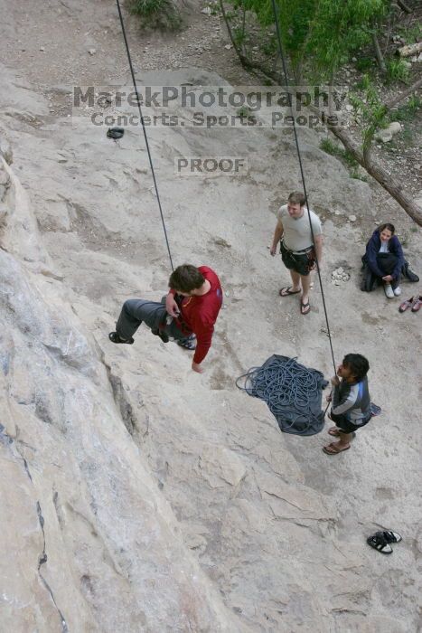 Me top rope climbing Diving for Rocks (5.10d) with Javier Morales belaying, photographed from  the third bolt of Magster (5.10a) by Andrew Dreher.  It was another long day of rock climbing at Seismic Wall on Austin's Barton Creek Greenbelt, Saturday, April 11, 2009.

Filename: SRM_20090411_17053902.JPG
Aperture: f/5.6
Shutter Speed: 1/320
Body: Canon EOS-1D Mark II
Lens: Canon EF 16-35mm f/2.8 L