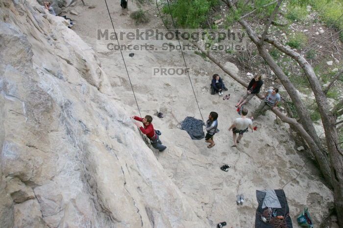 Me top rope climbing Diving for Rocks (5.10d) with Javier Morales belaying, photographed from  the third bolt of Magster (5.10a) by Andrew Dreher.  It was another long day of rock climbing at Seismic Wall on Austin's Barton Creek Greenbelt, Saturday, April 11, 2009.

Filename: SRM_20090411_17061103.JPG
Aperture: f/5.6
Shutter Speed: 1/320
Body: Canon EOS-1D Mark II
Lens: Canon EF 16-35mm f/2.8 L