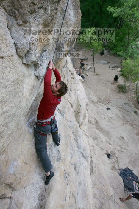 Me top rope climbing Diving for Rocks (5.10d) with Javier Morales belaying, photographed from  the third bolt of Magster (5.10a) by Andrew Dreher.  It was another long day of rock climbing at Seismic Wall on Austin's Barton Creek Greenbelt, Saturday, April 11, 2009.

Filename: SRM_20090411_17075218.JPG
Aperture: f/5.6
Shutter Speed: 1/320
Body: Canon EOS-1D Mark II
Lens: Canon EF 16-35mm f/2.8 L