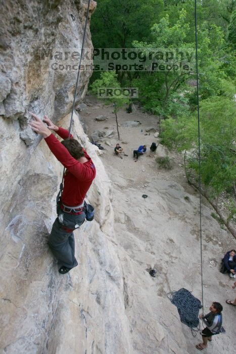 Me top rope climbing Diving for Rocks (5.10d) with Javier Morales belaying, photographed from  the third bolt of Magster (5.10a) by Andrew Dreher.  It was another long day of rock climbing at Seismic Wall on Austin's Barton Creek Greenbelt, Saturday, April 11, 2009.

Filename: SRM_20090411_17102350.JPG
Aperture: f/5.6
Shutter Speed: 1/320
Body: Canon EOS-1D Mark II
Lens: Canon EF 16-35mm f/2.8 L