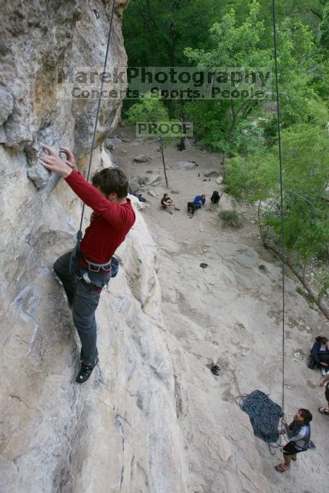 Me top rope climbing Diving for Rocks (5.10d) with Javier Morales belaying, photographed from  the third bolt of Magster (5.10a) by Andrew Dreher.  It was another long day of rock climbing at Seismic Wall on Austin's Barton Creek Greenbelt, Saturday, April 11, 2009.

Filename: SRM_20090411_17102651.JPG
Aperture: f/5.6
Shutter Speed: 1/320
Body: Canon EOS-1D Mark II
Lens: Canon EF 16-35mm f/2.8 L