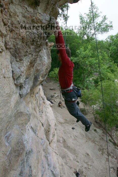 Me top rope climbing Diving for Rocks (5.10d), photographed from  the third bolt of Magster (5.10a) by Andrew Dreher.  It was another long day of rock climbing at Seismic Wall on Austin's Barton Creek Greenbelt, Saturday, April 11, 2009.

Filename: SRM_20090411_17130103.JPG
Aperture: f/5.6
Shutter Speed: 1/320
Body: Canon EOS-1D Mark II
Lens: Canon EF 16-35mm f/2.8 L