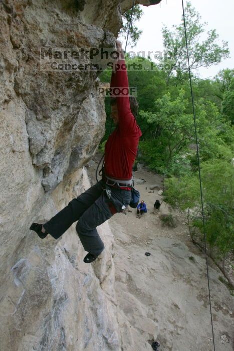 Me top rope climbing Diving for Rocks (5.10d), photographed from  the third bolt of Magster (5.10a) by Andrew Dreher.  It was another long day of rock climbing at Seismic Wall on Austin's Barton Creek Greenbelt, Saturday, April 11, 2009.

Filename: SRM_20090411_17130204.JPG
Aperture: f/5.6
Shutter Speed: 1/320
Body: Canon EOS-1D Mark II
Lens: Canon EF 16-35mm f/2.8 L