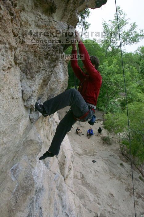 Me top rope climbing Diving for Rocks (5.10d), photographed from  the third bolt of Magster (5.10a) by Andrew Dreher.  It was another long day of rock climbing at Seismic Wall on Austin's Barton Creek Greenbelt, Saturday, April 11, 2009.

Filename: SRM_20090411_17130305.JPG
Aperture: f/5.6
Shutter Speed: 1/320
Body: Canon EOS-1D Mark II
Lens: Canon EF 16-35mm f/2.8 L