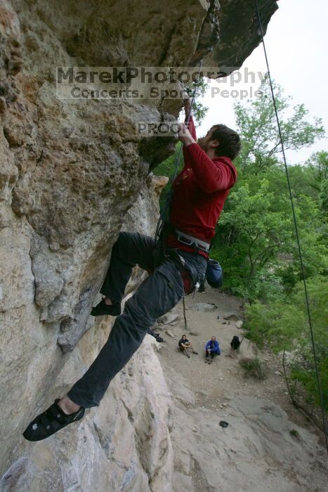 Me top rope climbing Diving for Rocks (5.10d), photographed from  the third bolt of Magster (5.10a) by Andrew Dreher.  It was another long day of rock climbing at Seismic Wall on Austin's Barton Creek Greenbelt, Saturday, April 11, 2009.

Filename: SRM_20090411_17131214.JPG
Aperture: f/5.6
Shutter Speed: 1/320
Body: Canon EOS-1D Mark II
Lens: Canon EF 16-35mm f/2.8 L