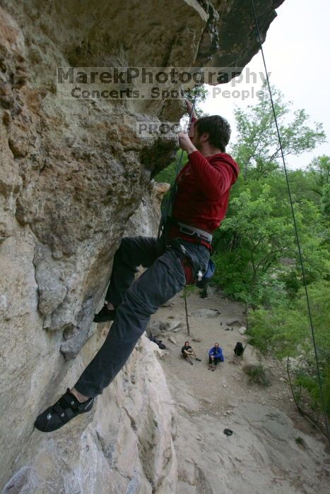 Me top rope climbing Diving for Rocks (5.10d), photographed from  the third bolt of Magster (5.10a) by Andrew Dreher.  It was another long day of rock climbing at Seismic Wall on Austin's Barton Creek Greenbelt, Saturday, April 11, 2009.

Filename: SRM_20090411_17131215.JPG
Aperture: f/5.6
Shutter Speed: 1/320
Body: Canon EOS-1D Mark II
Lens: Canon EF 16-35mm f/2.8 L