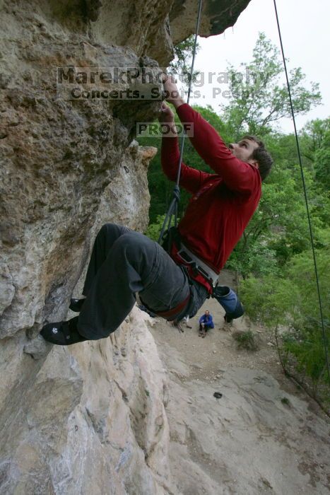 Me top rope climbing Diving for Rocks (5.10d), photographed from  the third bolt of Magster (5.10a) by Andrew Dreher.  It was another long day of rock climbing at Seismic Wall on Austin's Barton Creek Greenbelt, Saturday, April 11, 2009.

Filename: SRM_20090411_17132923.JPG
Aperture: f/5.6
Shutter Speed: 1/320
Body: Canon EOS-1D Mark II
Lens: Canon EF 16-35mm f/2.8 L