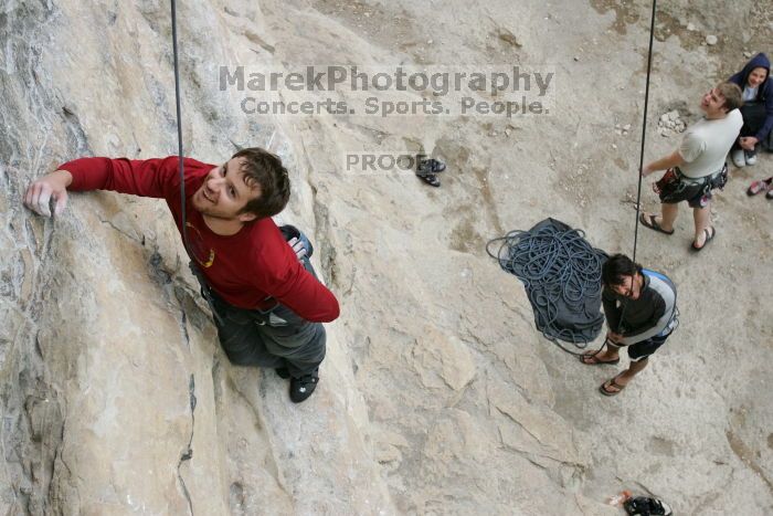 Me top rope climbing Diving for Rocks (5.10d) with Javier Morales belaying, photographed from  the third bolt of Magster (5.10a) by Andrew Dreher.  It was another long day of rock climbing at Seismic Wall on Austin's Barton Creek Greenbelt, Saturday, April 11, 2009.

Filename: SRM_20090411_17160627.JPG
Aperture: f/5.6
Shutter Speed: 1/320
Body: Canon EOS-1D Mark II
Lens: Canon EF 16-35mm f/2.8 L