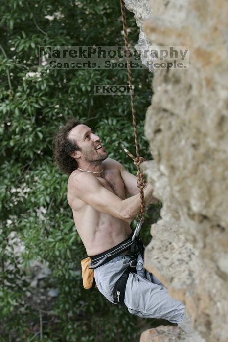 Jason Shear competing.  CTM hosted a speed climbing event at Seismic Wall on Diving for Rocks to benefit the Austin Area Food Bank, Saturday, May 9, 2009.

Filename: SRM_20090509_11213676.jpg
Aperture: f/5.0
Shutter Speed: 1/400
Body: Canon EOS-1D Mark II
Lens: Canon EF 80-200mm f/2.8 L