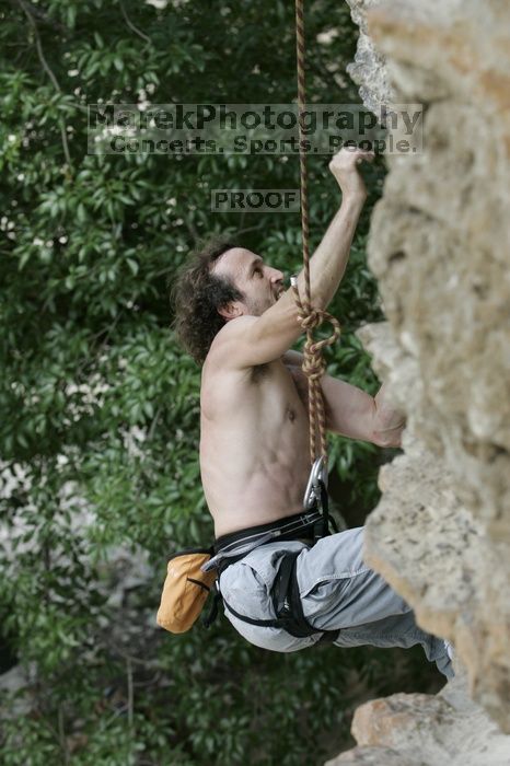 Jason Shear competing.  CTM hosted a speed climbing event at Seismic Wall on Diving for Rocks to benefit the Austin Area Food Bank, Saturday, May 9, 2009.

Filename: SRM_20090509_11213778.jpg
Aperture: f/5.0
Shutter Speed: 1/400
Body: Canon EOS-1D Mark II
Lens: Canon EF 80-200mm f/2.8 L