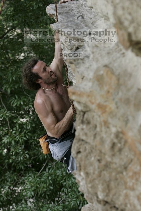 Jason Shear competing.  CTM hosted a speed climbing event at Seismic Wall on Diving for Rocks to benefit the Austin Area Food Bank, Saturday, May 9, 2009.

Filename: SRM_20090509_11214387.jpg
Aperture: f/5.0
Shutter Speed: 1/500
Body: Canon EOS-1D Mark II
Lens: Canon EF 80-200mm f/2.8 L