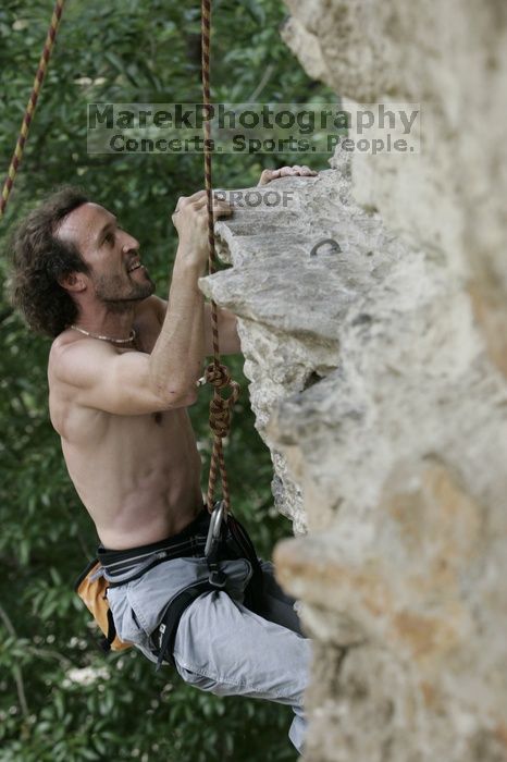 Jason Shear competing.  CTM hosted a speed climbing event at Seismic Wall on Diving for Rocks to benefit the Austin Area Food Bank, Saturday, May 9, 2009.

Filename: SRM_20090509_11214490.jpg
Aperture: f/5.0
Shutter Speed: 1/400
Body: Canon EOS-1D Mark II
Lens: Canon EF 80-200mm f/2.8 L