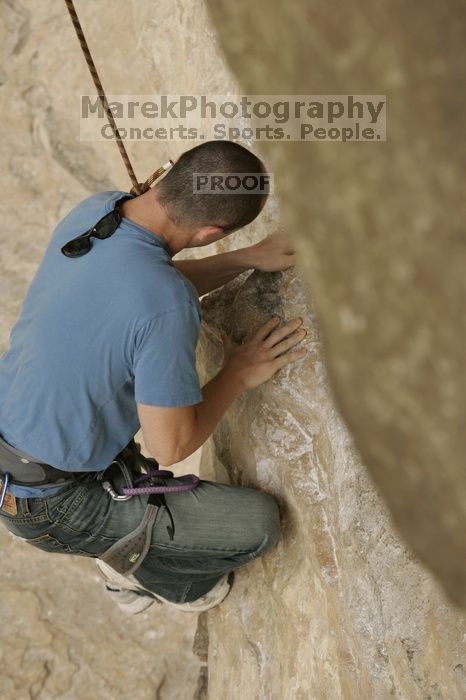 Sean O'Grady climbs in just running shoes.  CTM hosted a speed climbing event at Seismic Wall on Diving for Rocks to benefit the Austin Area Food Bank, Saturday, May 9, 2009.

Filename: SRM_20090509_11312493.jpg
Aperture: f/5.6
Shutter Speed: 1/1000
Body: Canon EOS-1D Mark II
Lens: Canon EF 80-200mm f/2.8 L