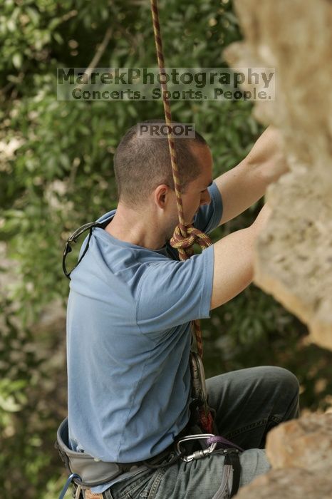 Sean O'Grady climbs in just running shoes.  CTM hosted a speed climbing event at Seismic Wall on Diving for Rocks to benefit the Austin Area Food Bank, Saturday, May 9, 2009.

Filename: SRM_20090509_11315095.jpg
Aperture: f/5.6
Shutter Speed: 1/400
Body: Canon EOS-1D Mark II
Lens: Canon EF 80-200mm f/2.8 L