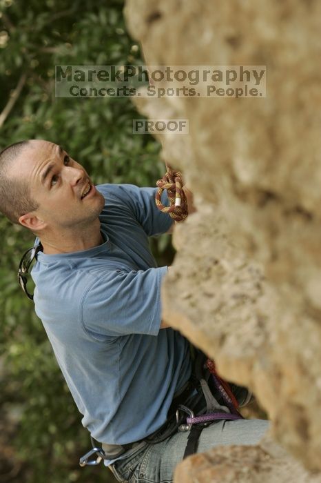 Sean O'Grady climbs in just running shoes.  CTM hosted a speed climbing event at Seismic Wall on Diving for Rocks to benefit the Austin Area Food Bank, Saturday, May 9, 2009.

Filename: SRM_20090509_11315297.jpg
Aperture: f/5.6
Shutter Speed: 1/500
Body: Canon EOS-1D Mark II
Lens: Canon EF 80-200mm f/2.8 L