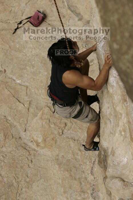 Long Ta, winner of the speed competition with a time of 15.33 seconds.  CTM hosted a speed climbing event at Seismic Wall on Diving for Rocks to benefit the Austin Area Food Bank, Saturday, May 9, 2009.

Filename: SRM_20090509_11332041.jpg
Aperture: f/5.6
Shutter Speed: 1/1000
Body: Canon EOS-1D Mark II
Lens: Canon EF 80-200mm f/2.8 L