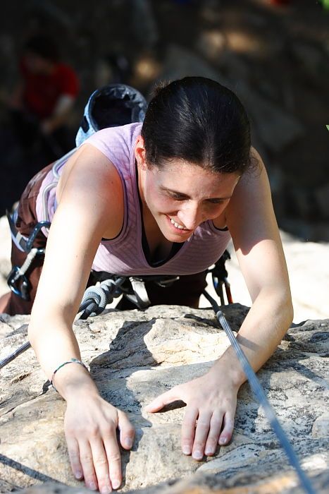 Beth Marek top rope climbing Roo Dog (5.8), taken from the anchors of the route.  It was Beth's third time outside, and another long day of rock climbing at Seismic Wall on Austin's Barton Creek Greenbelt, Monday, May 25, 2009.

Filename: SRM_20090525_09514989.JPG
Aperture: f/5.6
Shutter Speed: 1/400
Body: Canon EOS-1D Mark II
Lens: Canon EF 80-200mm f/2.8 L