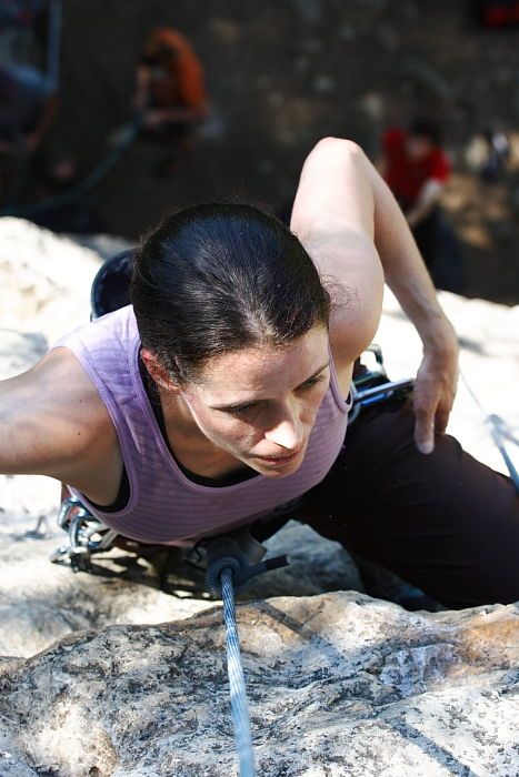 Beth Marek top rope climbing Roo Dog (5.8), taken from the anchors of the route.  It was Beth's third time outside, and another long day of rock climbing at Seismic Wall on Austin's Barton Creek Greenbelt, Monday, May 25, 2009.

Filename: SRM_20090525_09530203.JPG
Aperture: f/5.6
Shutter Speed: 1/200
Body: Canon EOS-1D Mark II
Lens: Canon EF 80-200mm f/2.8 L