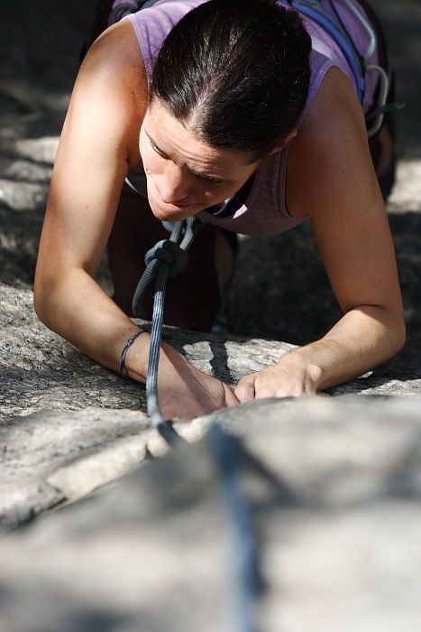 Beth Marek top rope climbing Hollywood (5.7), taken from the anchors of the route.  It was Beth's third time outside, and another long day of rock climbing at Seismic Wall on Austin's Barton Creek Greenbelt, Monday, May 25, 2009.

Filename: SRM_20090525_10400763.JPG
Aperture: f/5.6
Shutter Speed: 1/1000
Body: Canon EOS-1D Mark II
Lens: Canon EF 80-200mm f/2.8 L