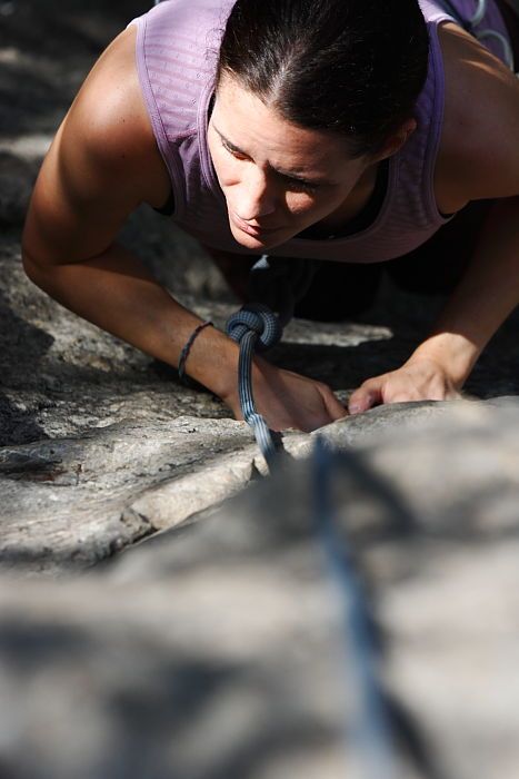 Beth Marek top rope climbing Hollywood (5.7), taken from the anchors of the route.  It was Beth's third time outside, and another long day of rock climbing at Seismic Wall on Austin's Barton Creek Greenbelt, Monday, May 25, 2009.

Filename: SRM_20090525_10400865.JPG
Aperture: f/5.6
Shutter Speed: 1/1250
Body: Canon EOS-1D Mark II
Lens: Canon EF 80-200mm f/2.8 L