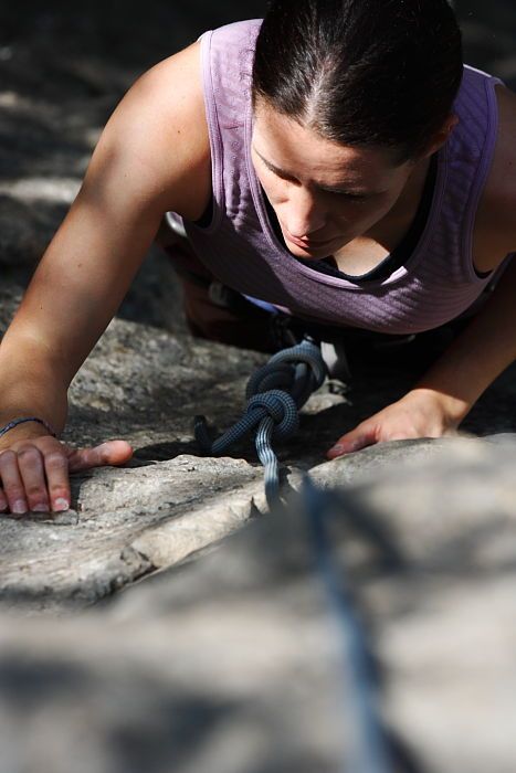 Beth Marek top rope climbing Hollywood (5.7), taken from the anchors of the route.  It was Beth's third time outside, and another long day of rock climbing at Seismic Wall on Austin's Barton Creek Greenbelt, Monday, May 25, 2009.

Filename: SRM_20090525_10400969.JPG
Aperture: f/5.6
Shutter Speed: 1/1250
Body: Canon EOS-1D Mark II
Lens: Canon EF 80-200mm f/2.8 L