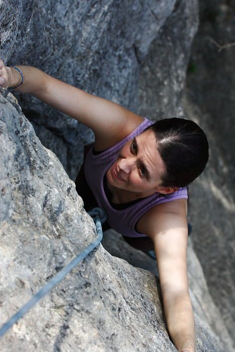 Beth Marek top rope climbing Hollywood (5.7), taken from the anchors of the route.  It was Beth's third time outside, and another long day of rock climbing at Seismic Wall on Austin's Barton Creek Greenbelt, Monday, May 25, 2009.

Filename: SRM_20090525_10422703.JPG
Aperture: f/5.6
Shutter Speed: 1/500
Body: Canon EOS-1D Mark II
Lens: Canon EF 80-200mm f/2.8 L