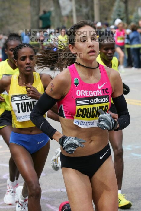 Kara Goucher was the third female to cross the finish line with a time of 2:32:25.  The 113th Boston Marathon took place on Monday, April 20, 2009.

Filename: SRM_20090420_10334005.JPG
Aperture: f/8.0
Shutter Speed: 1/640
Body: Canon EOS-1D Mark II
Lens: Canon EF 100-400mm f/4.5-5.6 L IS USM