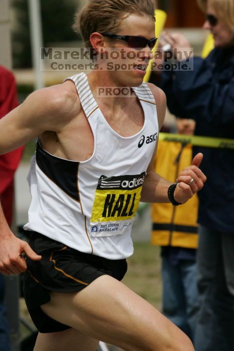 Ryan Hall was third to cross the finish line with a time of 2:09:40.  The 113th Boston Marathon took place on Monday, April 20, 2009.

Filename: SRM_20090420_10402040.JPG
Aperture: f/8.0
Shutter Speed: 1/1250
Body: Canon EOS-1D Mark II
Lens: Canon EF 100-400mm f/4.5-5.6 L IS USM