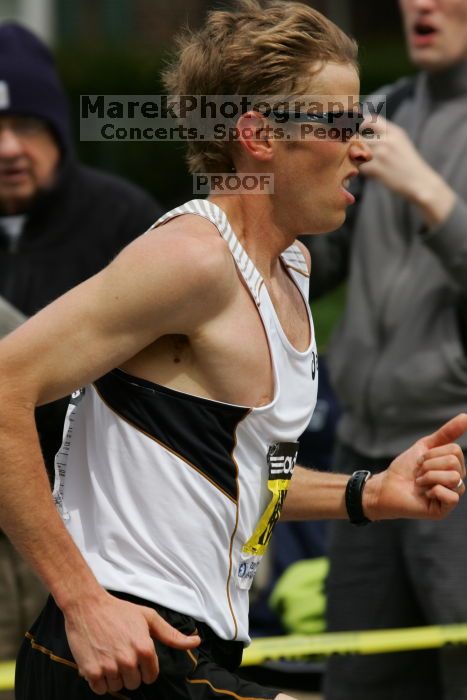 Ryan Hall was third to cross the finish line with a time of 2:09:40.  The 113th Boston Marathon took place on Monday, April 20, 2009.

Filename: SRM_20090420_10402248.JPG
Aperture: f/8.0
Shutter Speed: 1/1000
Body: Canon EOS-1D Mark II
Lens: Canon EF 100-400mm f/4.5-5.6 L IS USM