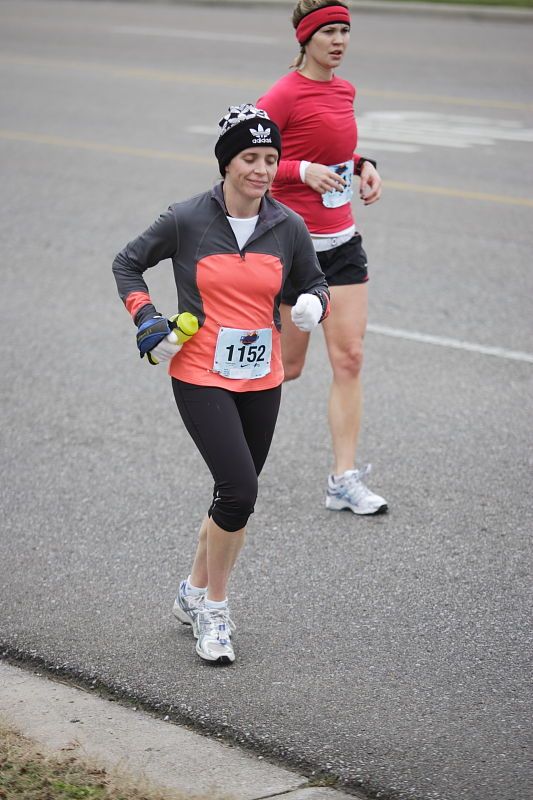 Beth Marek running the Rocket City Marathon on Saturday, December 12, 2009 in Huntsville.

Filename: SRM_20091212_12022640.JPG
Aperture: f/2.8
Shutter Speed: 1/800
Body: Canon EOS-1D Mark II
Lens: Canon EF 80-200mm f/2.8 L