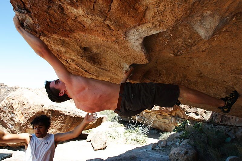 Raanan Robertson rock climbing in Hueco Tanks State Park and Historic Site during the Hueco Tanks Awesome Fest 2010 trip, Saturday, May 22, 2010.

Filename: SRM_20100522_12022260.JPG
Aperture: f/5.6
Shutter Speed: 1/200
Body: Canon EOS-1D Mark II
Lens: Canon EF 16-35mm f/2.8 L