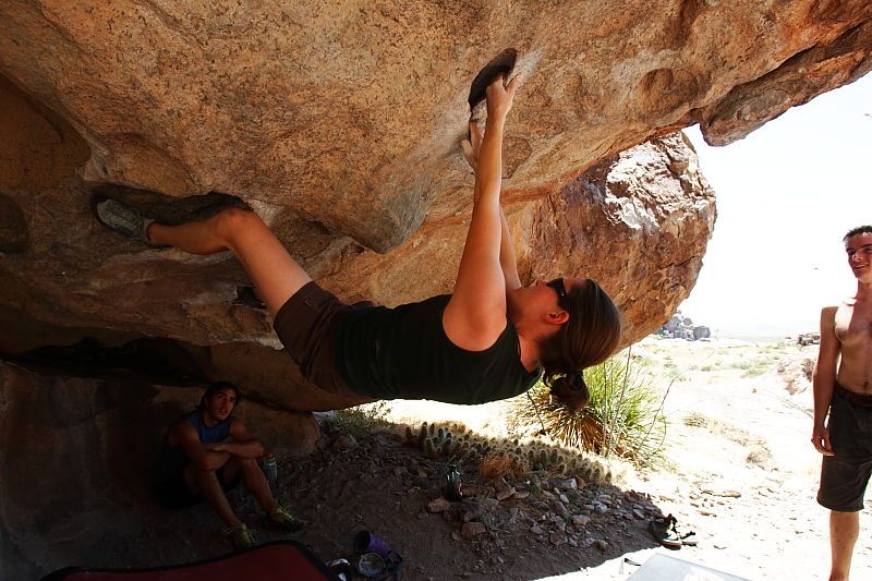 Beth Marek rock climbing on No One Gets Out of Here Alive (V2) in Hueco Tanks State Park and Historic Site during the Hueco Tanks Awesome Fest 2010 trip, Saturday, May 22, 2010.

Filename: SRM_20100522_15142871.JPG
Aperture: f/8.0
Shutter Speed: 1/160
Body: Canon EOS-1D Mark II
Lens: Canon EF 16-35mm f/2.8 L