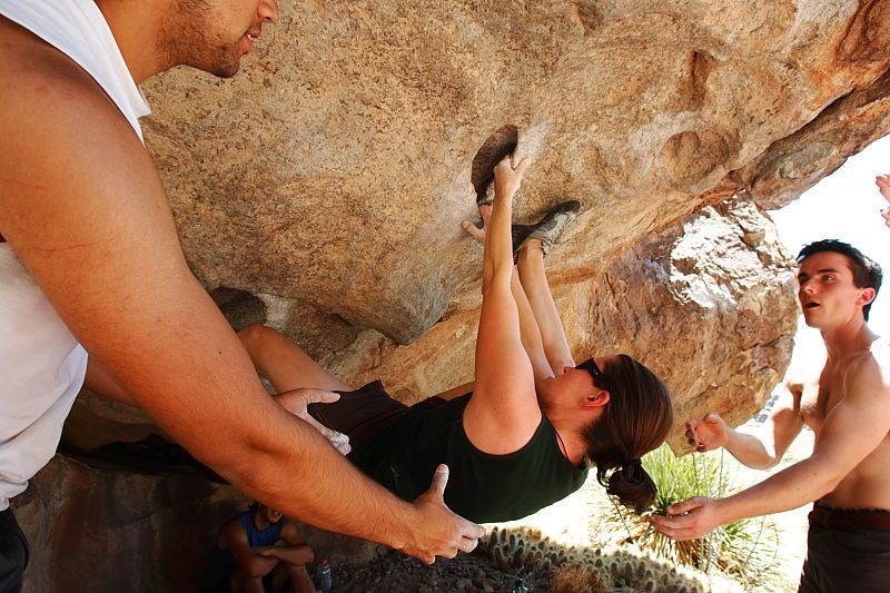 Beth Marek rock climbing on No One Gets Out of Here Alive (V2) in Hueco Tanks State Park and Historic Site during the Hueco Tanks Awesome Fest 2010 trip, Saturday, May 22, 2010.

Filename: SRM_20100522_15143574.JPG
Aperture: f/8.0
Shutter Speed: 1/100
Body: Canon EOS-1D Mark II
Lens: Canon EF 16-35mm f/2.8 L