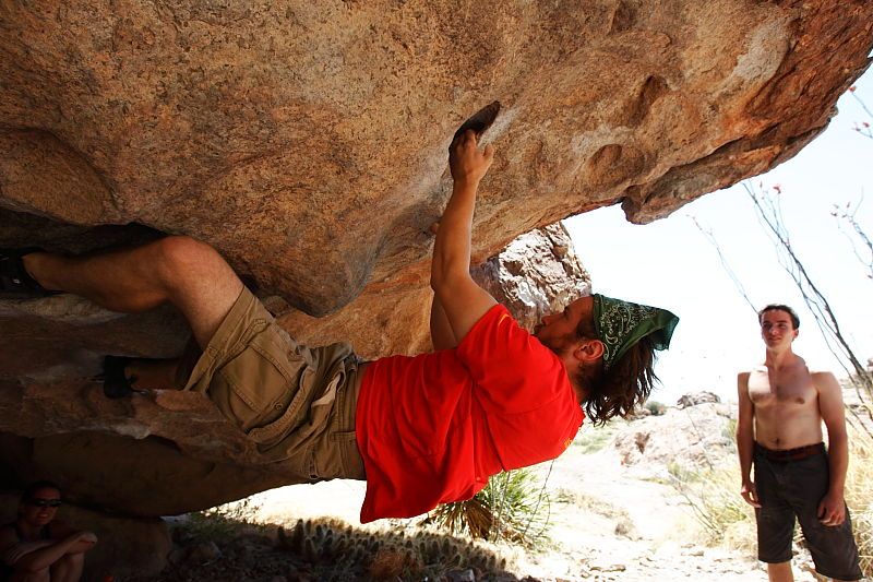 Steve Marek rock climbing on No One Gets Out of Here Alive (V2) in Hueco Tanks State Park and Historic Site during the Hueco Tanks Awesome Fest 2010 trip, Saturday, May 22, 2010.

Filename: SRM_20100522_15182503.JPG
Aperture: f/5.6
Shutter Speed: 1/640
Body: Canon EOS-1D Mark II
Lens: Canon EF 16-35mm f/2.8 L