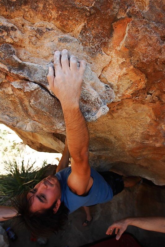 Javier Morales rock climbing on No One Gets Out of Here Alive (V2) in Hueco Tanks State Park and Historic Site during the Hueco Tanks Awesome Fest 2010 trip, Saturday, May 22, 2010.

Filename: SRM_20100522_15231645.JPG
Aperture: f/5.6
Shutter Speed: 1/500
Body: Canon EOS-1D Mark II
Lens: Canon EF 16-35mm f/2.8 L