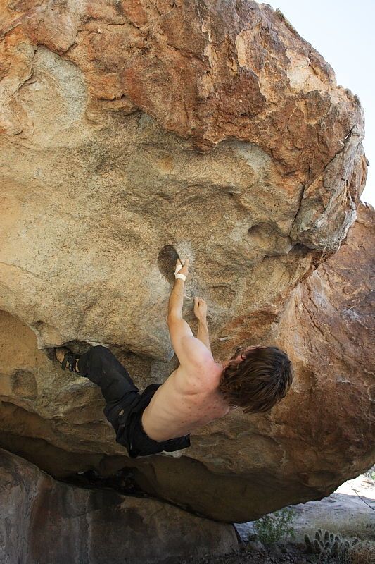 Andrew Dreher rock climbing on No One Gets Out of Here Alive (V2) in Hueco Tanks State Park and Historic Site during the Hueco Tanks Awesome Fest 2010 trip, Sunday, May 23, 2010.

Filename: SRM_20100523_10515737.JPG
Aperture: f/5.6
Shutter Speed: 1/640
Body: Canon EOS-1D Mark II
Lens: Canon EF 16-35mm f/2.8 L