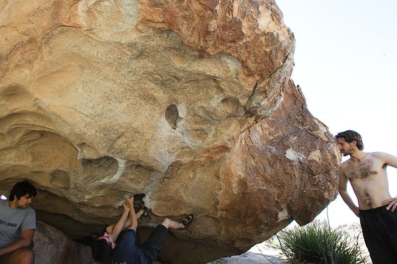 Raanan Robertson rock climbing on No One Gets Out of Here Alive (V2) in Hueco Tanks State Park and Historic Site during the Hueco Tanks Awesome Fest 2010 trip, Sunday, May 23, 2010.

Filename: SRM_20100523_10564378.JPG
Aperture: f/5.6
Shutter Speed: 1/640
Body: Canon EOS-1D Mark II
Lens: Canon EF 16-35mm f/2.8 L